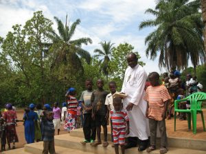 brother-achilleo-kiwanuka-after-mass-with-the-little-ones-at-rimenze-parish